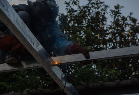Welding steel by the male worker in industrial metal steel.の写真素材