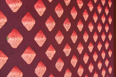 Brick block pink and light through hole.の写真素材