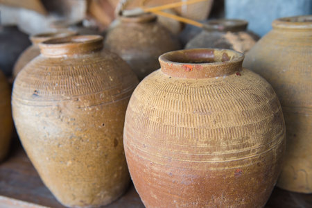 many old jars earthenware from Thailand .の写真素材