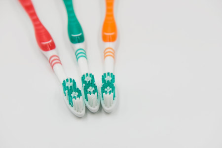 Closeup new toothbrushes isolated on a white background.の写真素材
