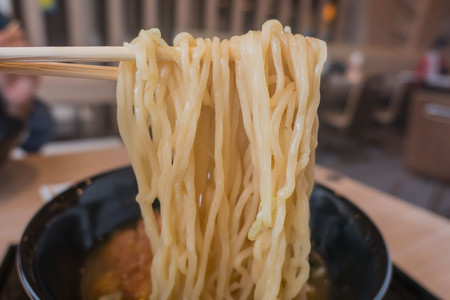Japanese Ramen noodles with chopsticks .の写真素材