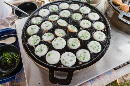 khanom krok in pan. Thai sweet dessert made from coconut milk .の写真素材