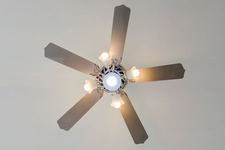 Vintage ceiling fan and lamp on white background .の写真素材