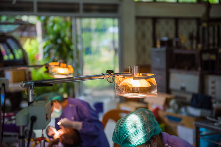 Lamps in the dental room and The doctor cares for the patient background.の写真素材