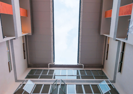 Modern pattern of High rise building and sky Background .
