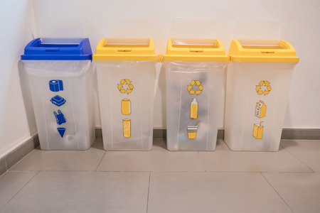 Blue and yellow Garbage containers for recycling .の写真素材