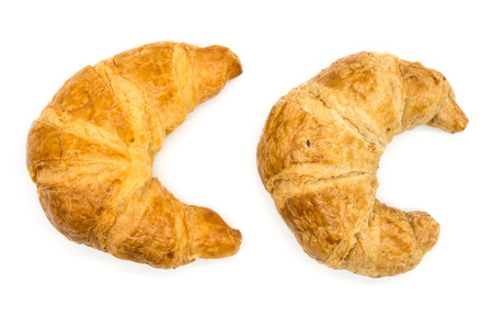Fresh two croissant isolated on a white background closeup .の写真素材