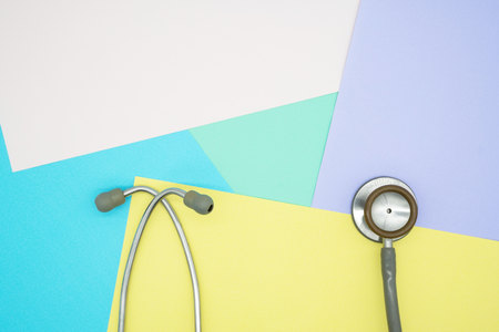 top view Medical equipment StethoscopeÂ on colorful pastel paper for background .の写真素材