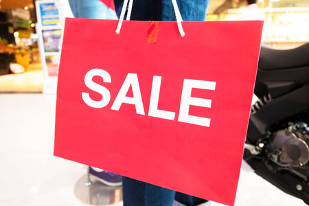 sale shopping paper red bag .Shopping Concept .の写真素材