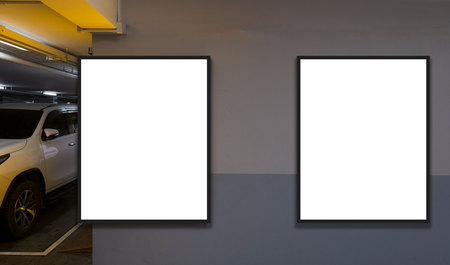 indoor car parking and empty white billboard .Blank space for text and images.の写真素材