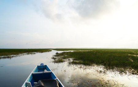 landscape ,boat on the river, summer day .Copy Space Area .の写真素材