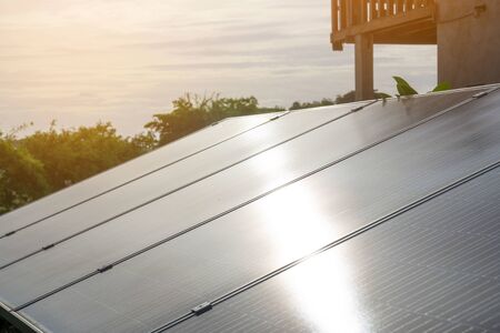 Solar panel, photovoltaic, alternative electricity source in the countryside and sky background .の写真素材