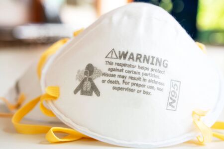 N95 RespiratorsÂ on white background ,White medical mask isolated. Face mask protection against pollution, virus, flu ,coronavirus ,covid 19. Health care and surgical concept.の写真素材