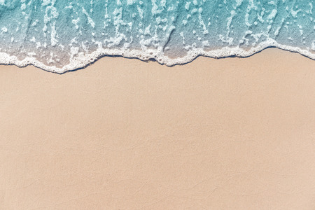 Close up soft wave lapped the sandy beach, Summer Background.の写真素材