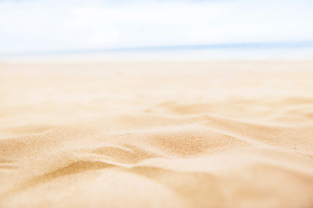 Summer sand beach and sea sky backgroundの写真素材
