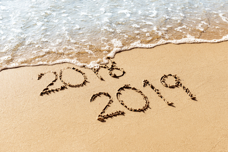 New Year 2019 replace 2018 on the sea beach conceptの写真素材