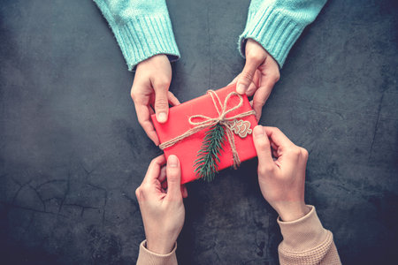 Gives a gift Christmas presents with decoration background. Celebration party and anniversary concepts ideas.の写真素材