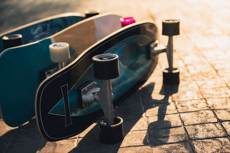 Close up surf skate or skateboard at park sunsetの写真素材