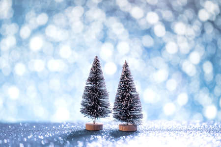 Closeup - Christmas tree toy with snow bokeh. Christmas holiday celebration and new year 2022 background concept, copy space.の写真素材