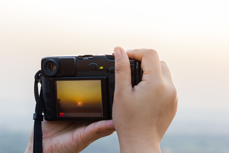 Photographers are shooting sunsets.の写真素材