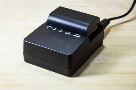 Charger and battery