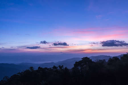Mountain complex and colorful sky for background.の写真素材