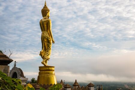 Buddha statue standing at Wat Phra That Khao Noi, Nan, thailand.の写真素材
