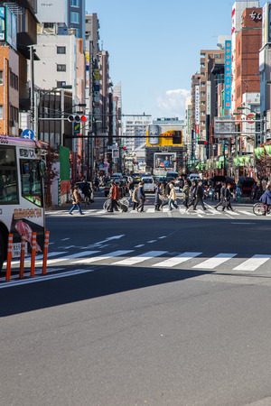 TOKYO, JAPAN - Nov 16, 2017: Travelers are crossing the street at the crosswalk on the Asakusa Roadのeditorial素材