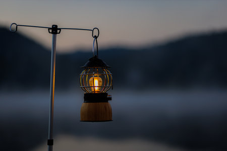 Vintage Camping Lantern  in Campground area at natural parklandの写真素材