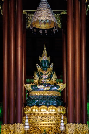A sacred replica of Thailand's Emerald Buddha, a beautiful emerald green, is enshrined at Wat Phra Kaew in Chiang Rai Province.の写真素材