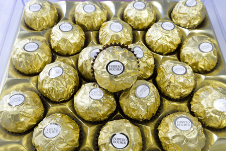 Bangkok Thailand- FEBRUARY 07, 2016: Ferrero Rocher is a chocolate sweet made by Italian Ferrero Spa. Rocher comes from French and means "rock" after a grotto in the Roman Catholic shrine of Lourdes.のeditorial素材
