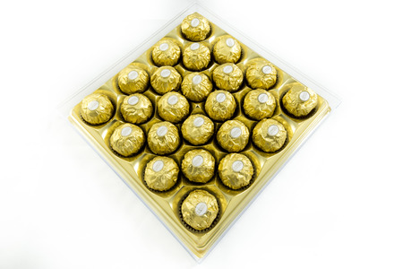 Bangkok Thailand- FEBRUARY 10, 2016: Ferrero Rocher is a chocolate sweet made by Italian Ferrero Spa. Rocher comes from French and means "rock" after a grotto in the Roman Catholic shrine of Lourdes ideal for a gift valentine's dayのeditorial素材