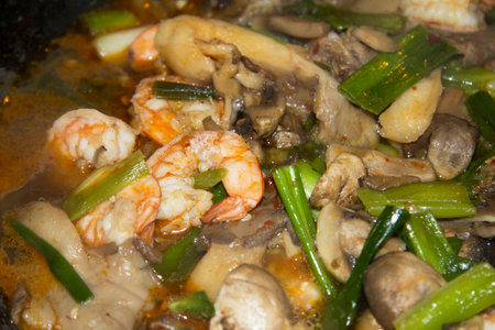 stir fry shrimp with mushroom and green onionの写真素材
