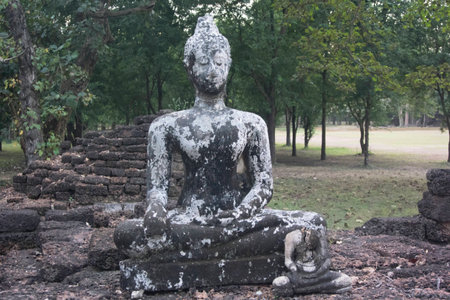 antique buddha statue at Srisatchanalai Historic Park Sukhothaiの写真素材