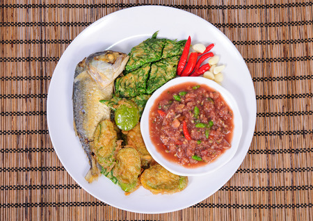 Shrimp Paste Chilli Sauce (Nam Prik Ka Pi) serve with Fried Mackerel and vegetable, Thai Foodの写真素材