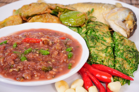 Shrimp Paste Chilli Sauce (Nam Prik Ka Pi) serve with Fried Mackerel and vegetable, Thai Foodの写真素材