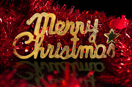 Christmas background character gold with a red ornamentの写真素材