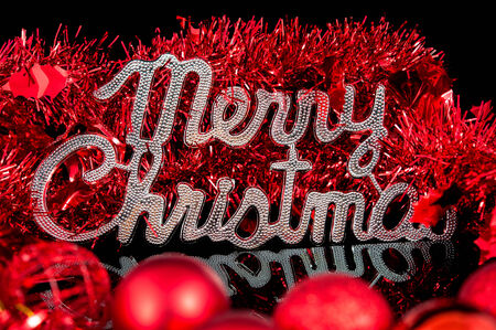 Christmas background character silver with a red ornamentの写真素材