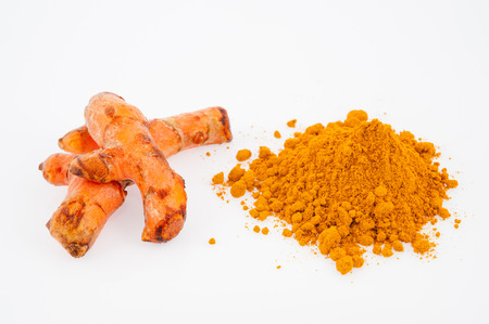Turmeric barks and powder isolated on white backgroundの写真素材