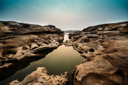 The Amazing of Rock,Natural of Rock Canyon in Khong River after the water come down in Summer,Three Thousand Hole,Ubonratchathanee Province,North East of Thailandの写真素材