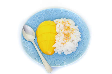Thai style tropical dessert glutinous rice eat with mangoesの写真素材