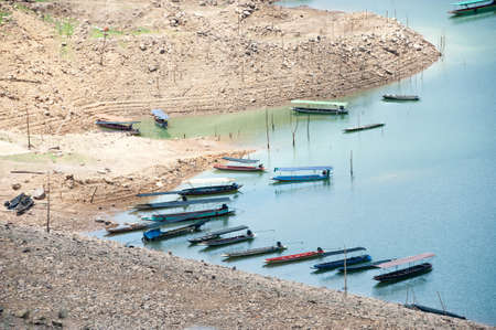 fishing boats on river in Thailandの写真素材