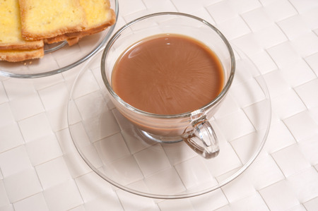 Toasts butter with a cup of coffeeの写真素材