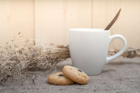 Cookies with a glass of milk with spoon on sackcloth Vintage Styleの写真素材