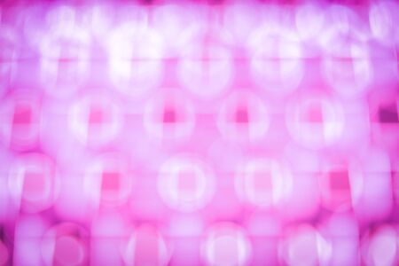 Abstract blurry bokeh pink color texture backgroundの写真素材