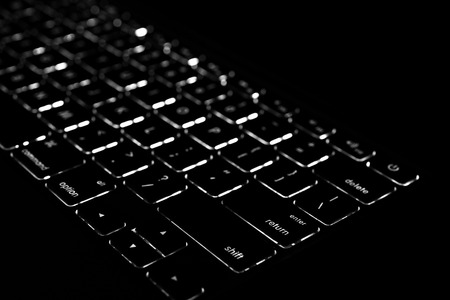 keyboard has a light underneath for use at night.の写真素材
