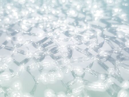 Abstract blurred and bokeh crystal soil whit color effect for texture background