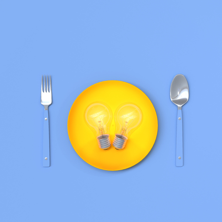 Light bulb in plate with spoon and fork . Energy concept,3D renderの写真素材