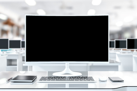 Work desk with PC blank screen with selective focus with clipping path and mock-up for your text, 3d render.の写真素材