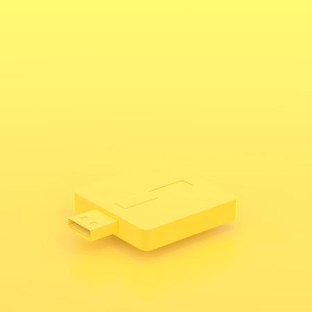 Minimal concept, USB flash drive yellow pastel color and copy space for your text, 3d render.の写真素材